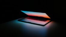 gray and black laptop computer on surface