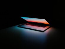 gray and black laptop computer on surface