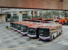orange and white bus lot