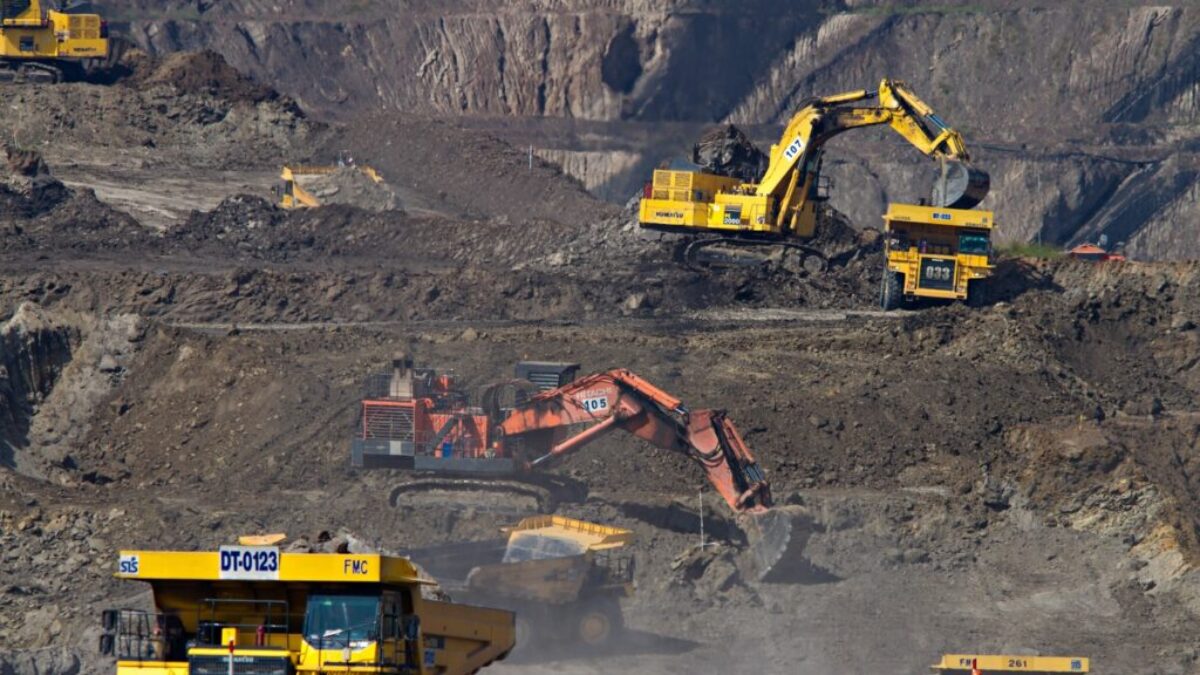 photography of excavators at mining area