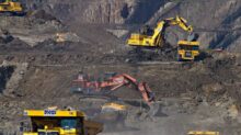 photography of excavators at mining area