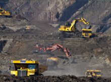 photography of excavators at mining area