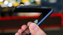 person holding black android smartphone