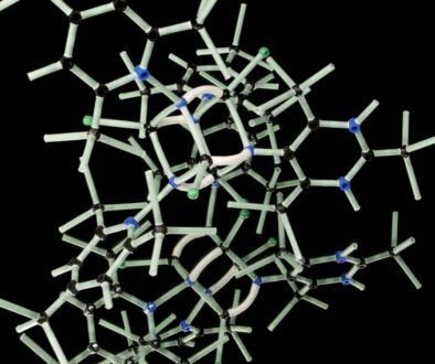 white plastic wire puzzle with black background