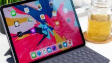 turned-on black tablet computer with keyboard