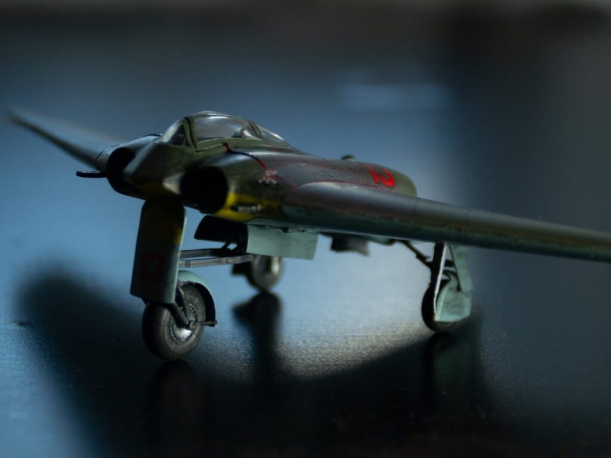 black and yellow fighter plane