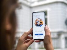 person holding white android smartphone