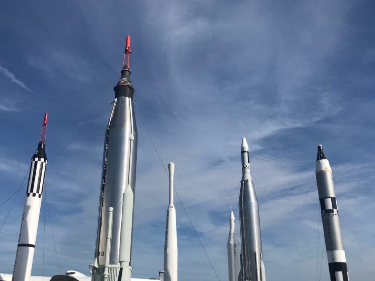 low angle photo of concrete towers