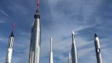 low angle photo of concrete towers