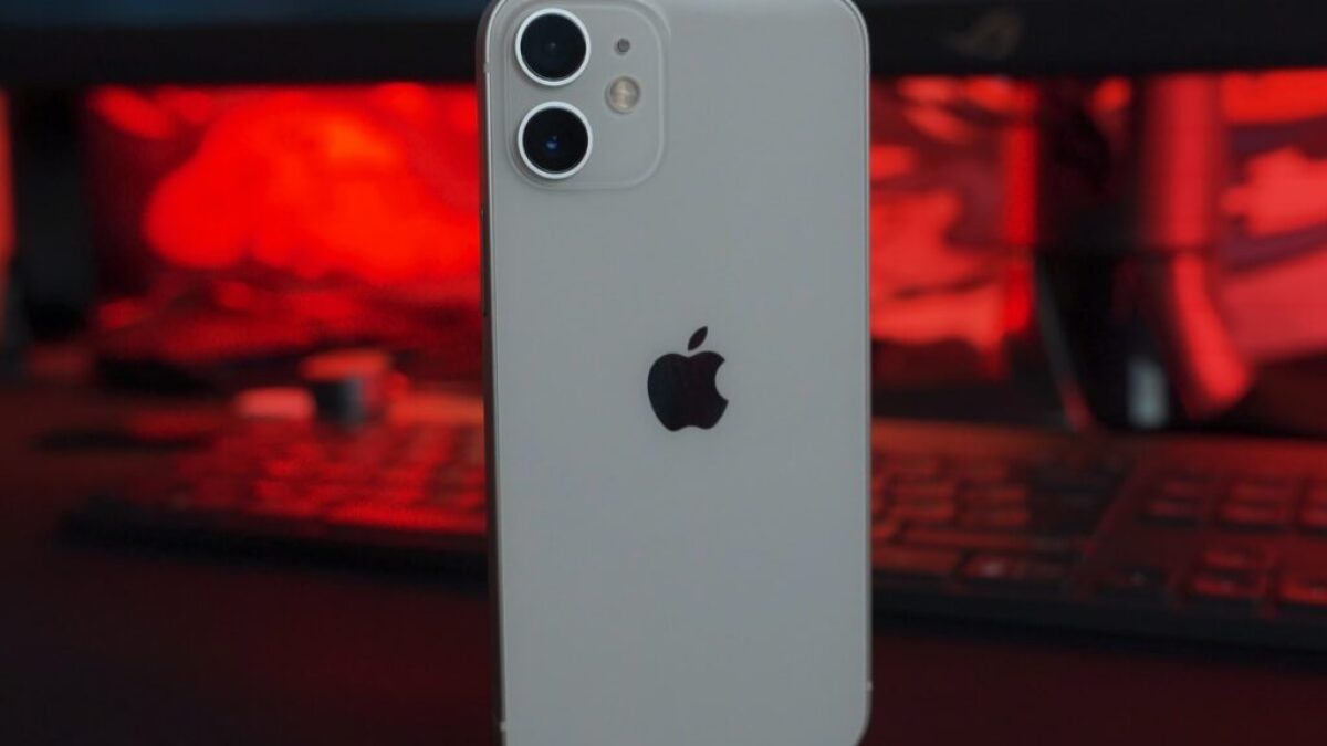white iphone 5 c on table