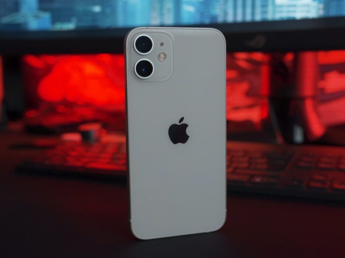 white iphone 5 c on table
