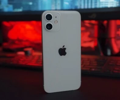 white iphone 5 c on table