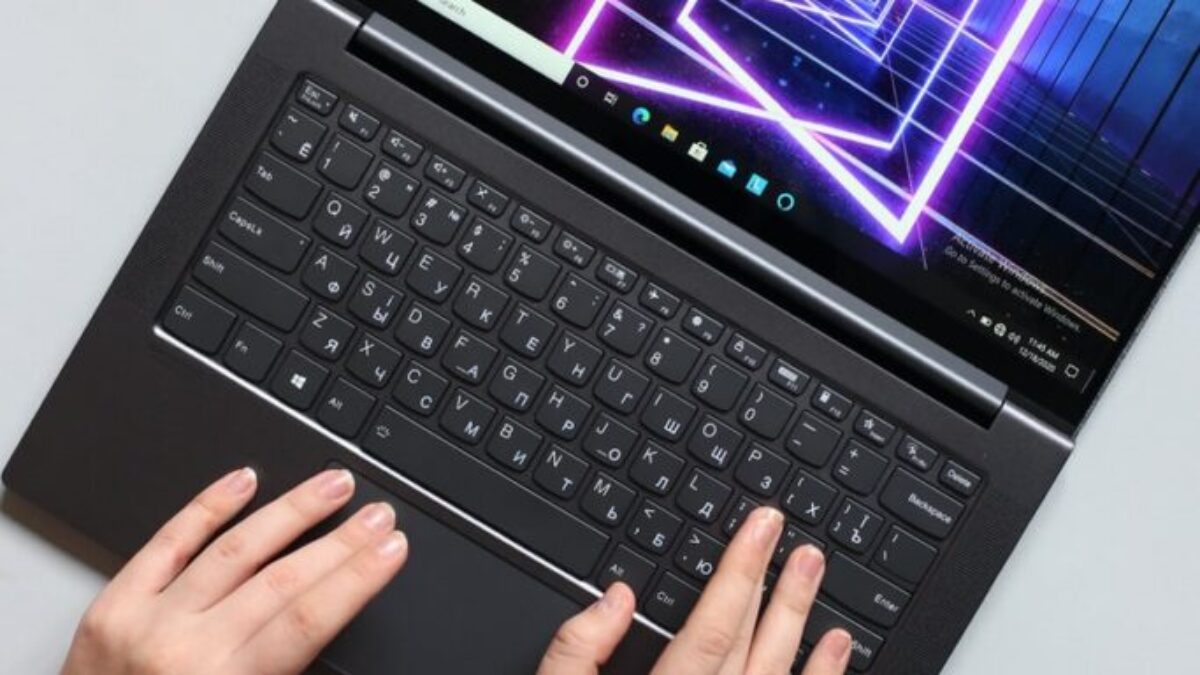 person using black laptop computer