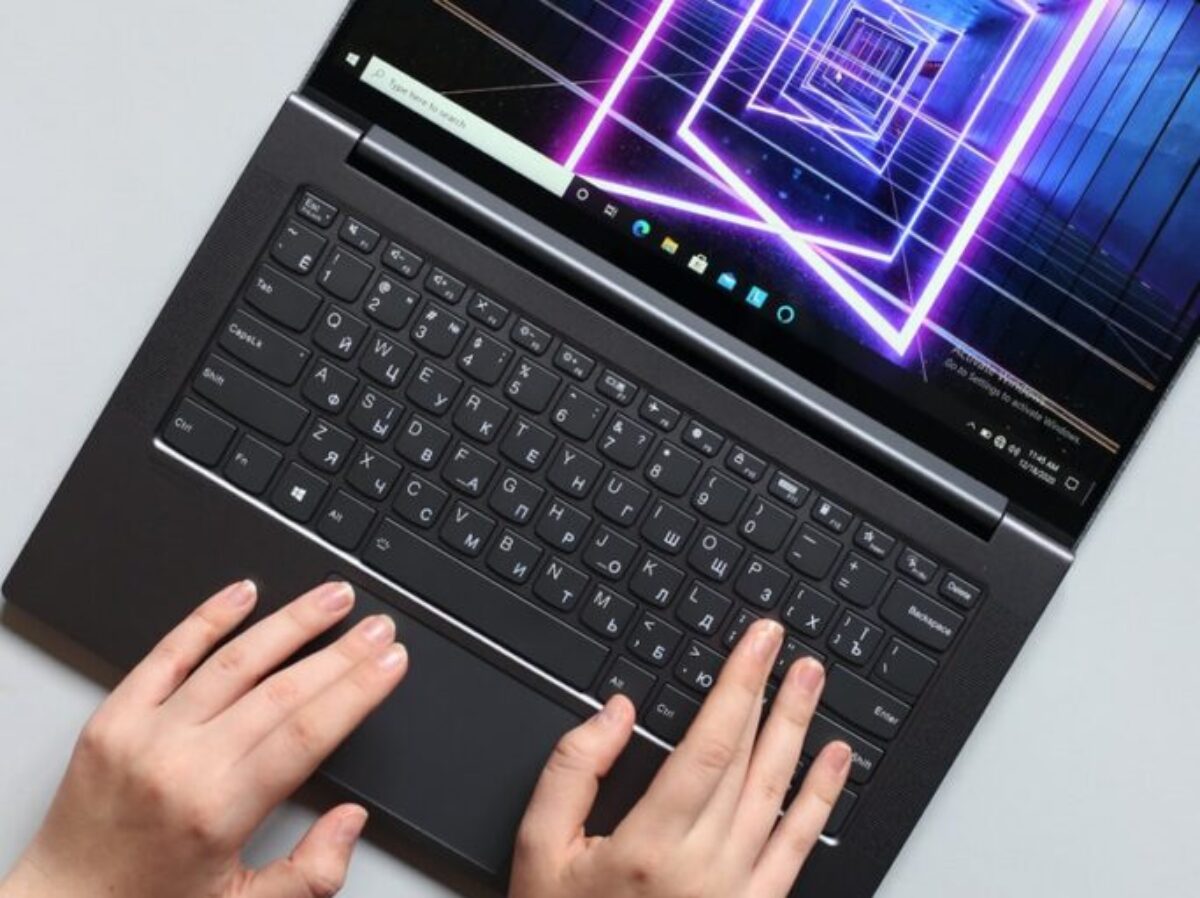person using black laptop computer