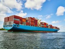 A Massive Container Ship Plies The Savannah River In Savannah, G