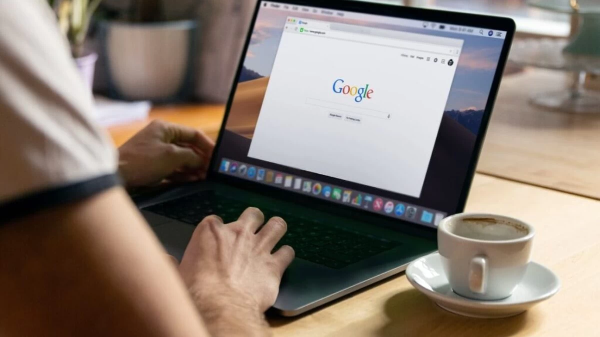 person using black laptop computer