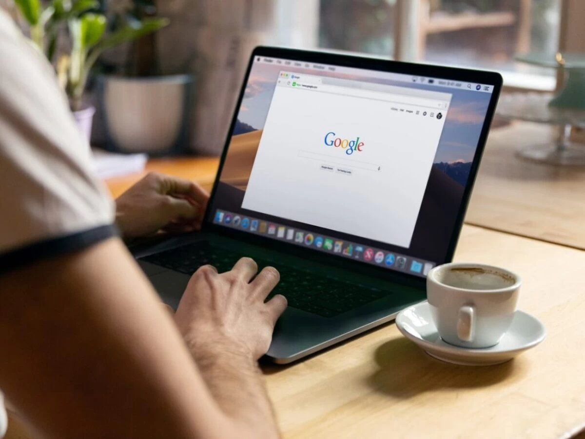 person using black laptop computer