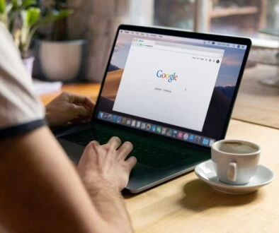 person using black laptop computer
