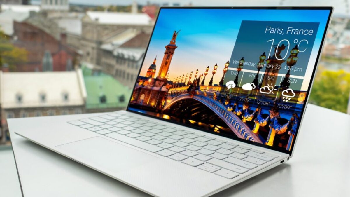 laptop on white table