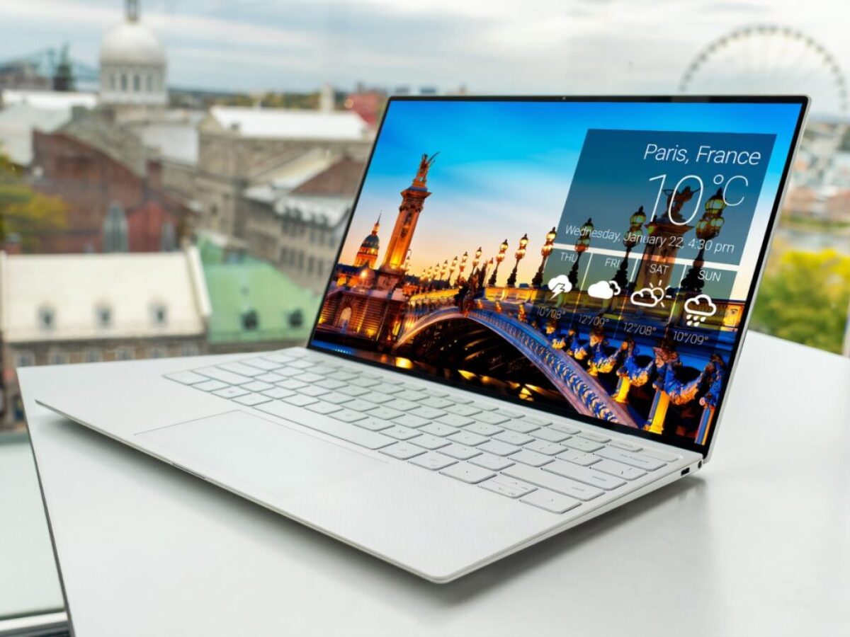laptop on white table