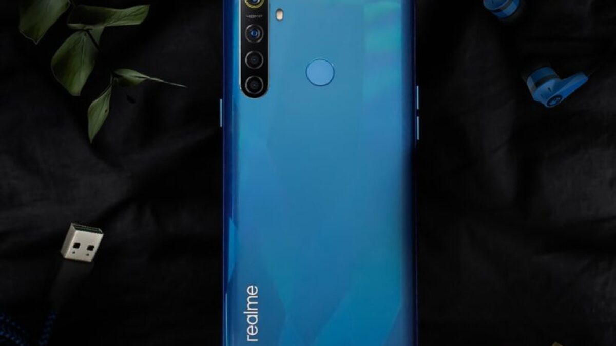 blue samsung android smartphone on blue textile