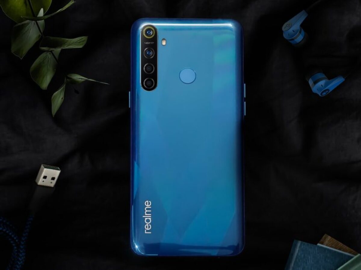 blue samsung android smartphone on blue textile
