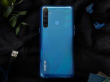 blue samsung android smartphone on blue textile