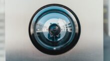selective focus photography of lens