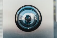 selective focus photography of lens