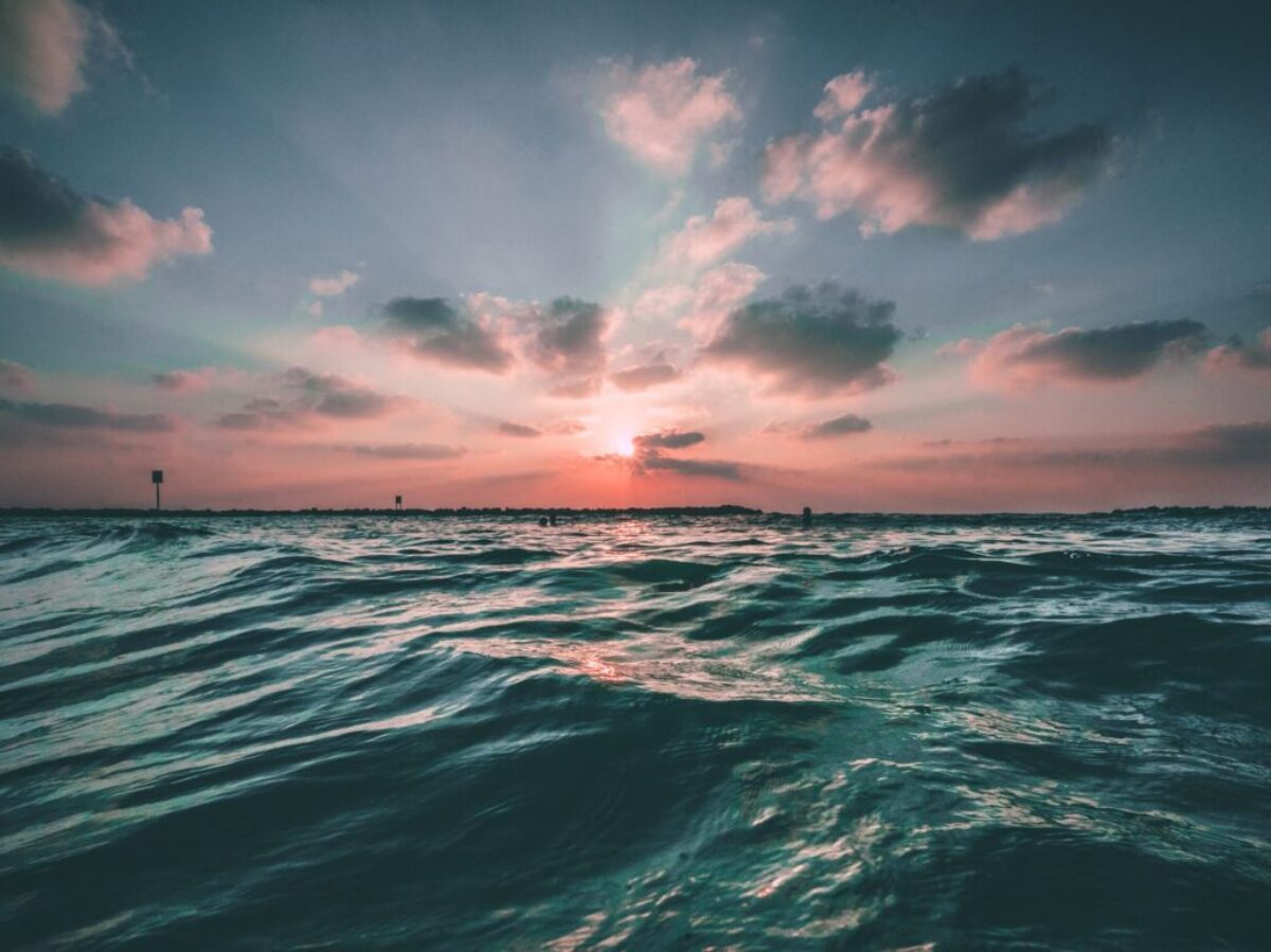 body of water during golden hour