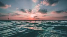 body of water during golden hour