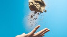 person throwing rock