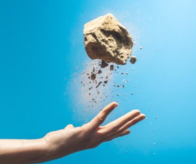 person throwing rock