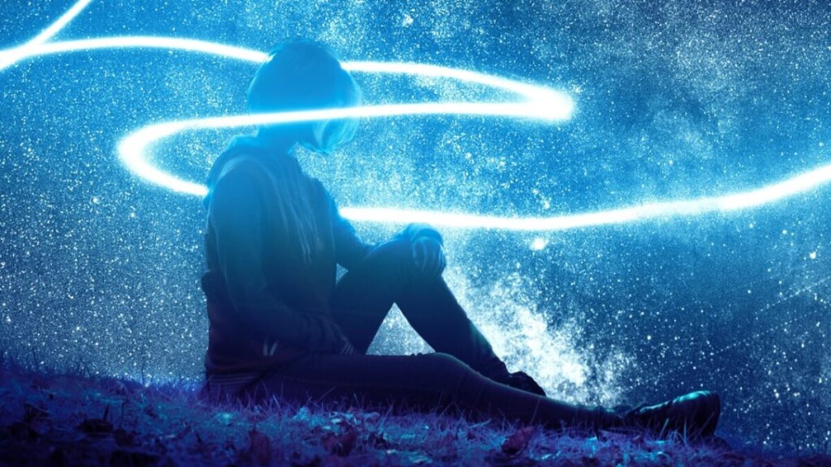 person seated on grass
