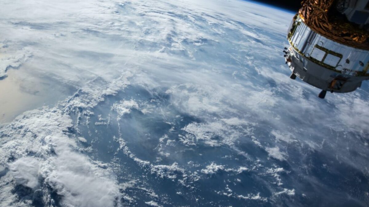 view of Earth and satellite