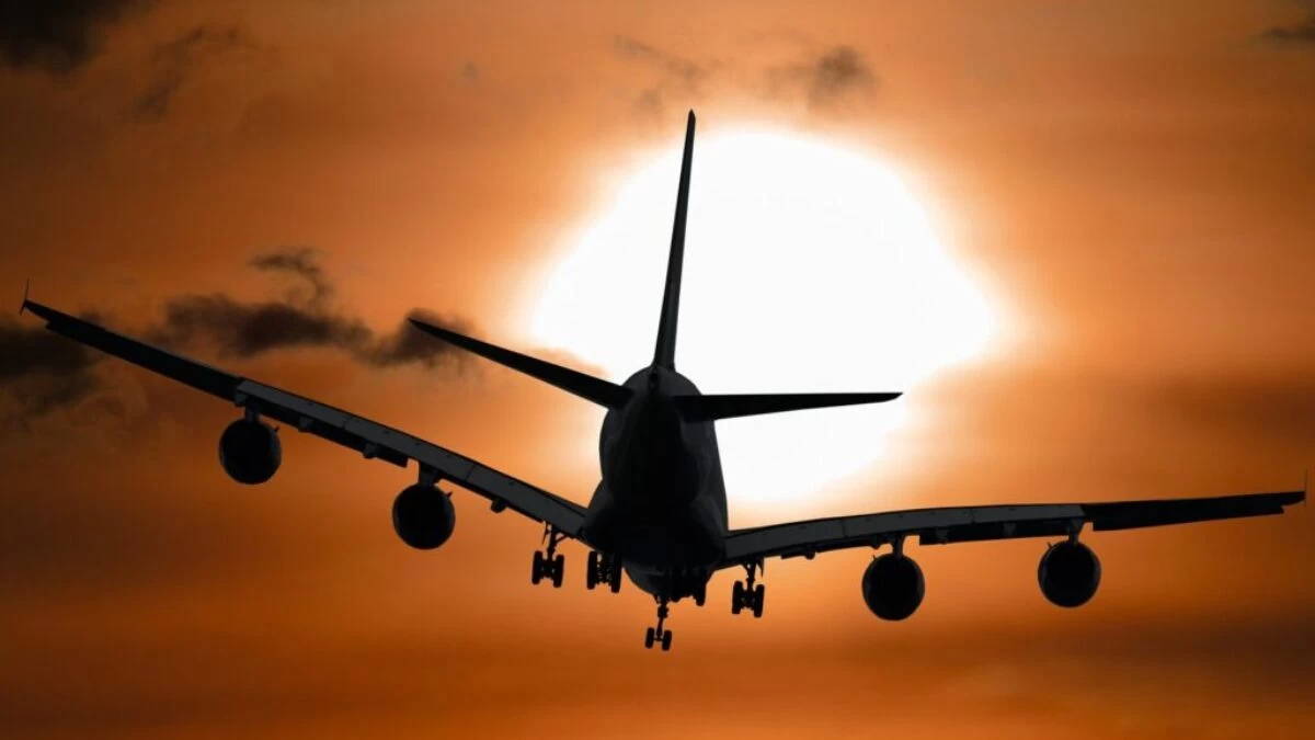 Shadow Image of a Plane Flying during Sunset
