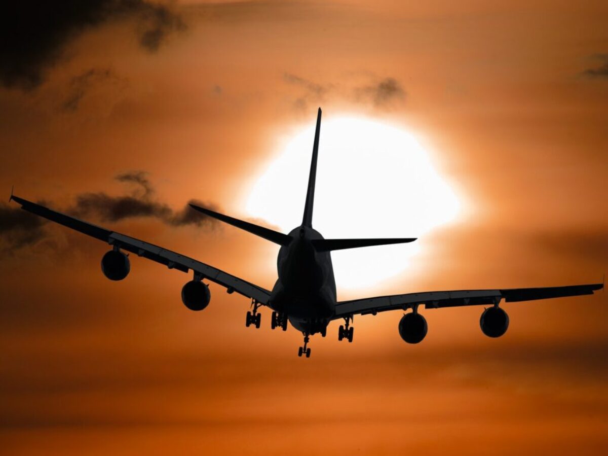 Shadow Image of a Plane Flying during Sunset