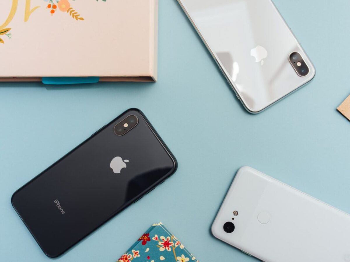 space gray iPhone X on blue surface