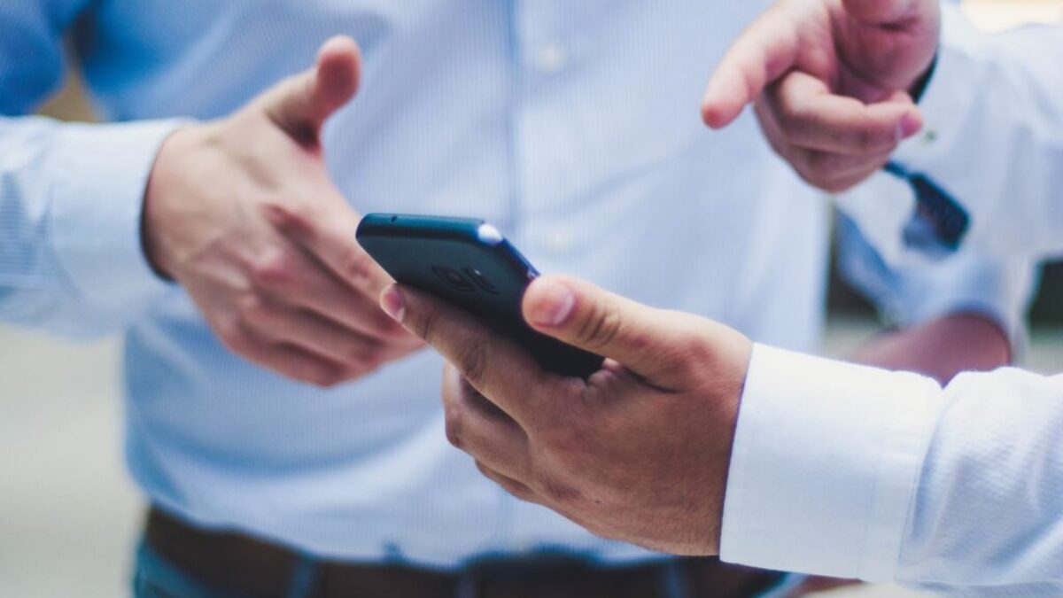 person holding black smartphone