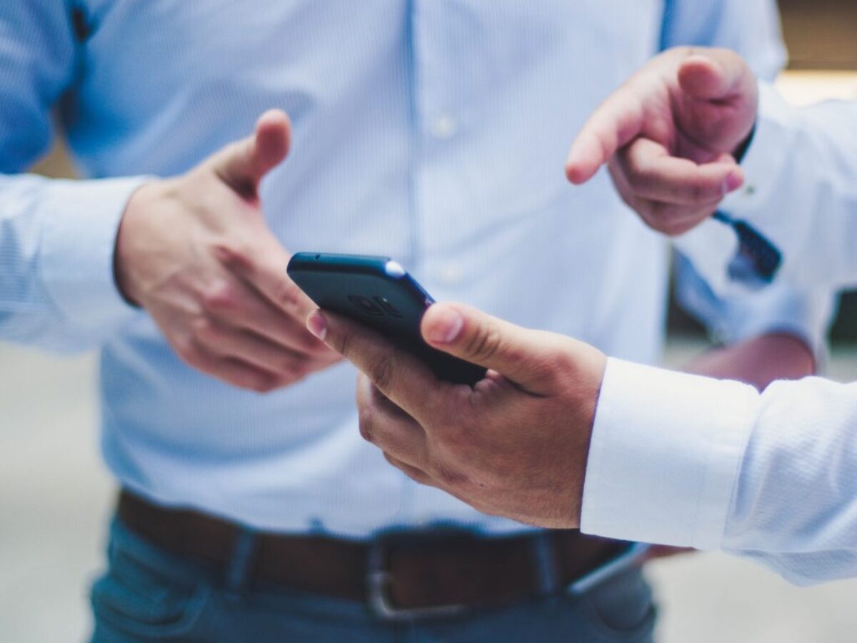 person holding black smartphone
