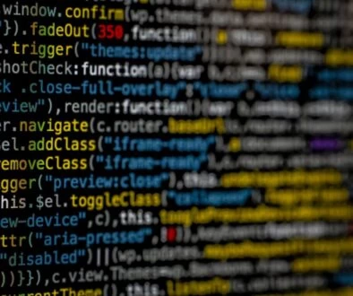 yellow and blue data code displayed on screen