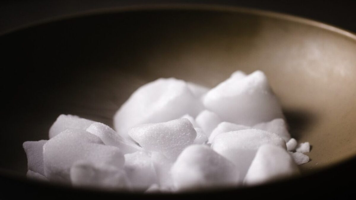 white sugar on gray bowl