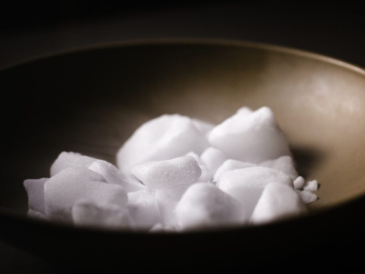 white sugar on gray bowl