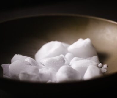 white sugar on gray bowl