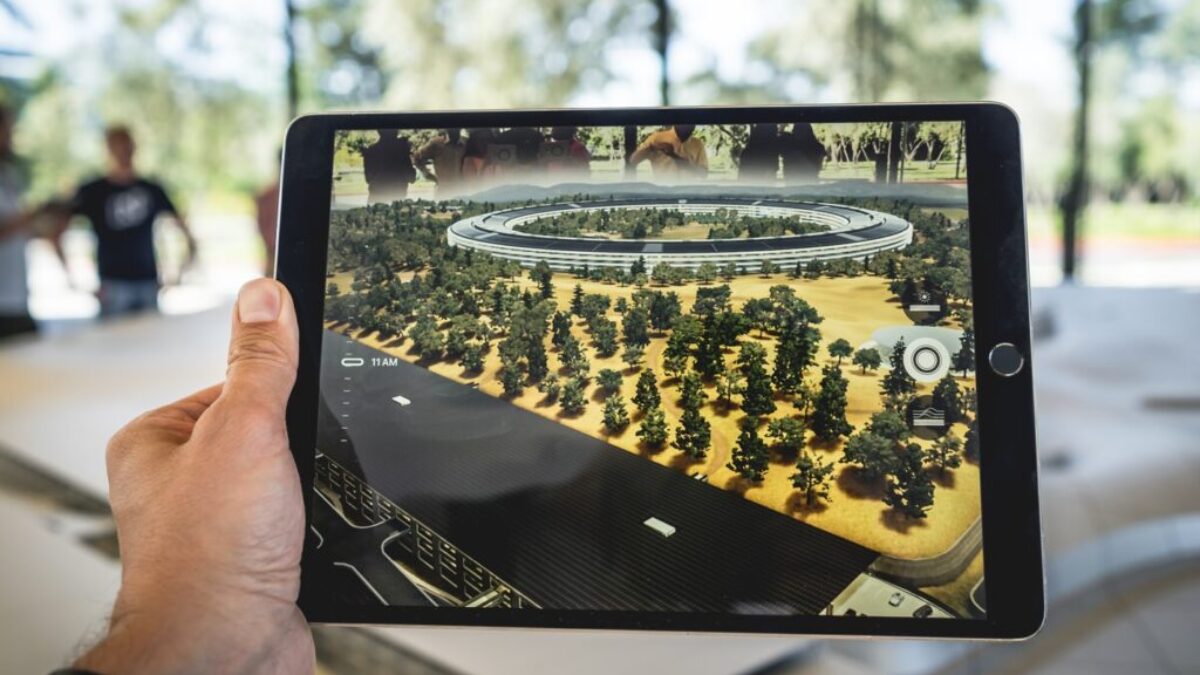 person holding black iPad