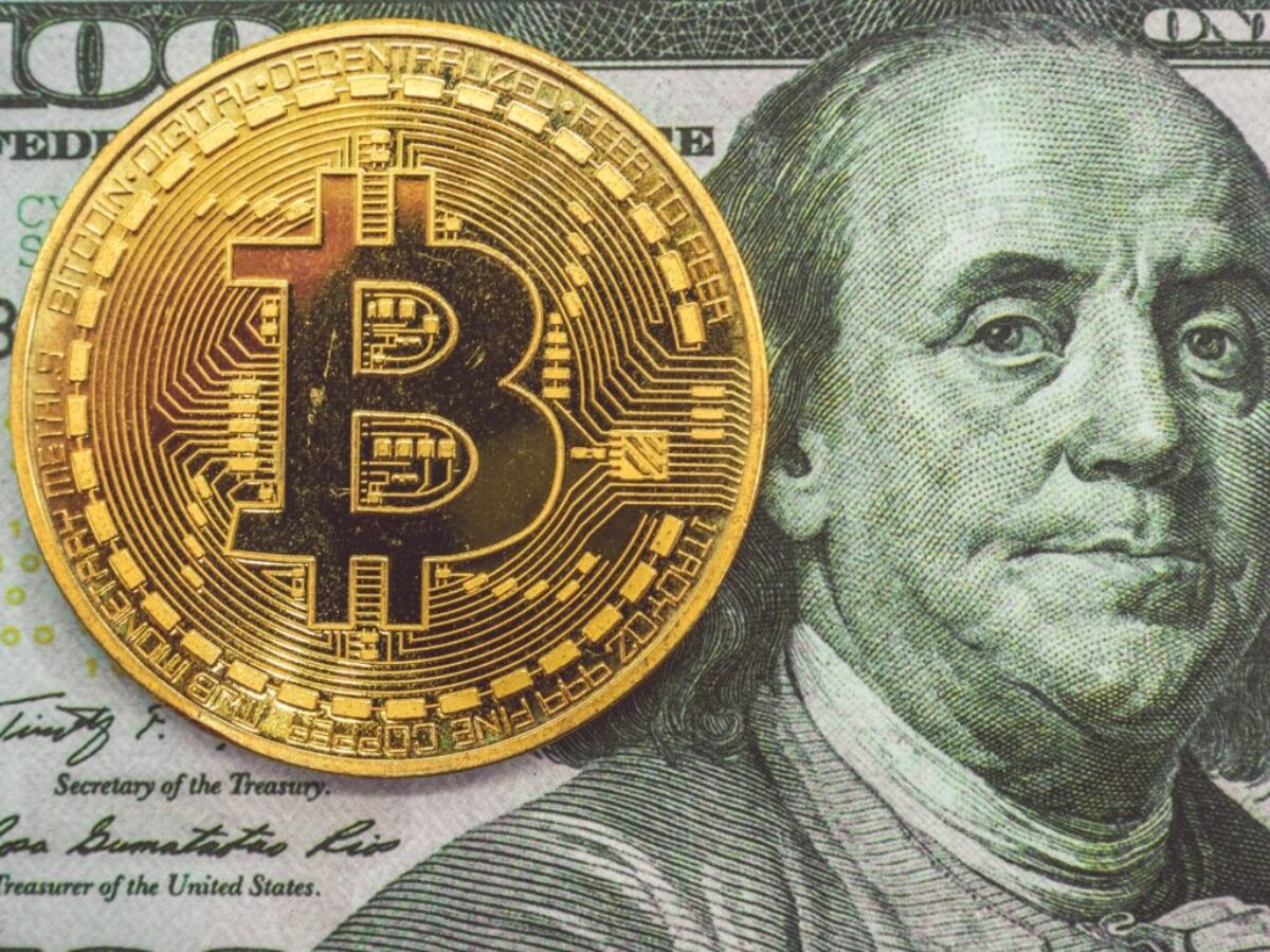 gold and black round coin
