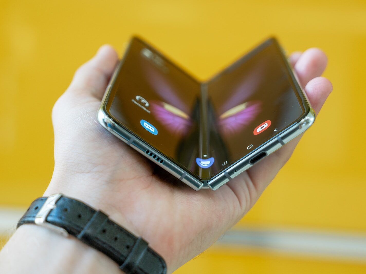 person holding black phone