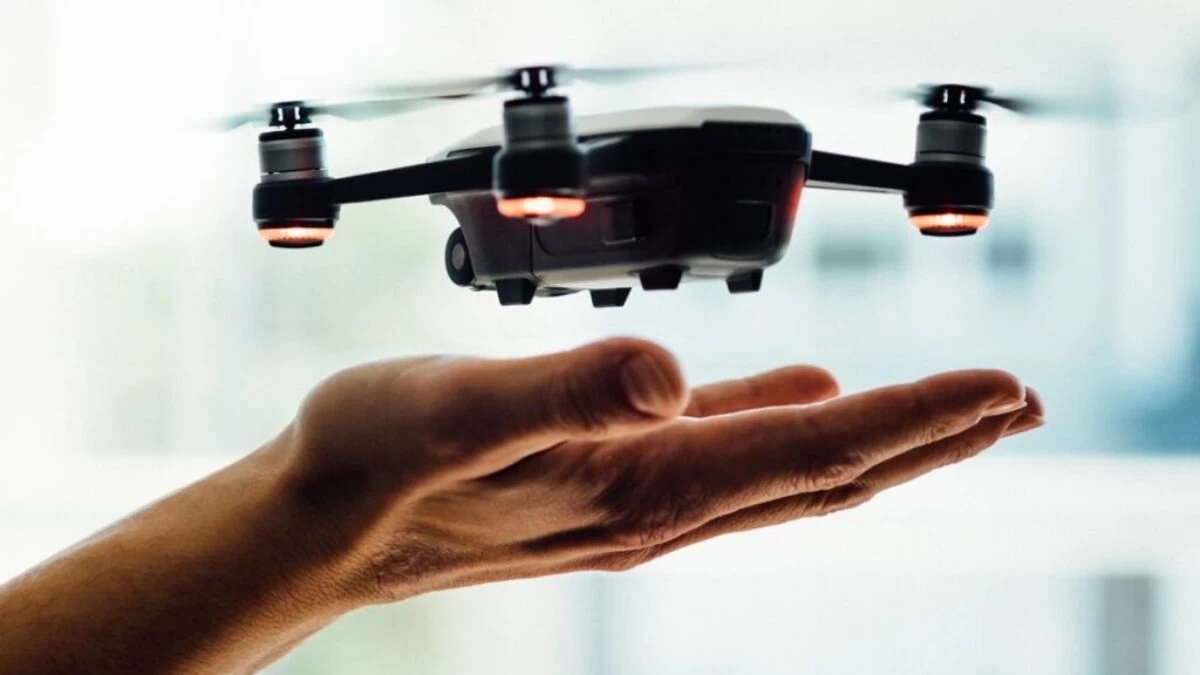 turned on black quadcopter drone