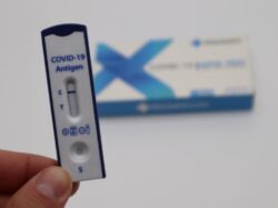 white and blue digital thermometer