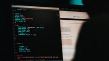 flat screen computer monitor displaying white and black screen